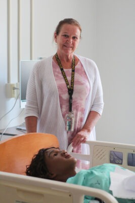 Dr. Shelley Cobbett in one of several clinical learning and simulation center labs at the Dalhousie School of Nursing (Yarmouth Campus).